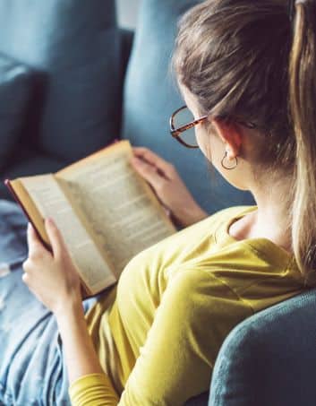 teen girl reading literature
